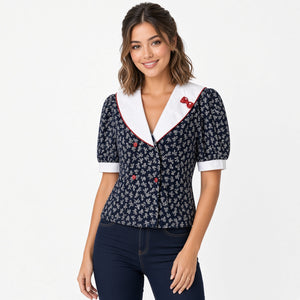 Vintage  navy sailor blouse with white collar and bow print, front
Vintage navy sailor blouse sailor collar front view